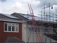 Solar Panel Installation Solar PV Panel Installation Bicester Oxfordshire OX12 front with scaffolding